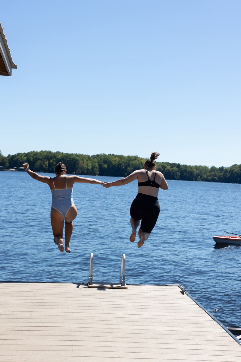 Jumping off the dock into the lake